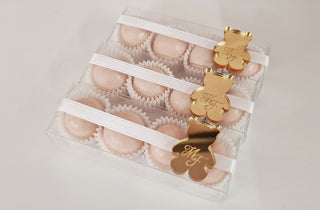 Transparent box with tag and confetti