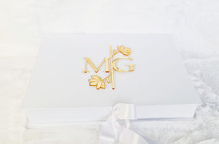 White box with flower and engraved wedding tag